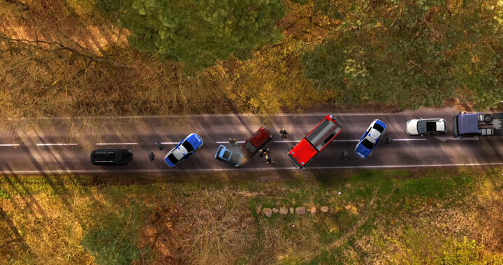 truck accident on the road with multiple cars