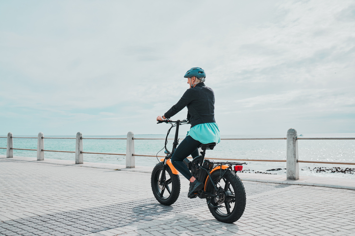 woman riding an electric bicycle